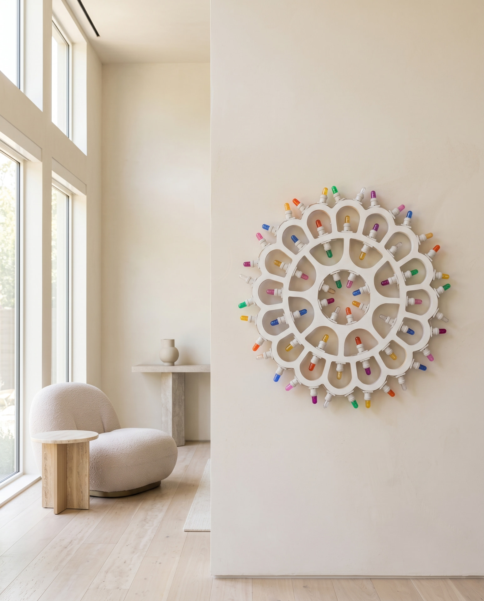 Salento luminaria as a sculptural wall object in a luxury American interior during daylight